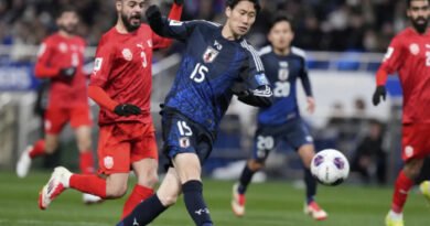 Japan Bow Out With Heads High